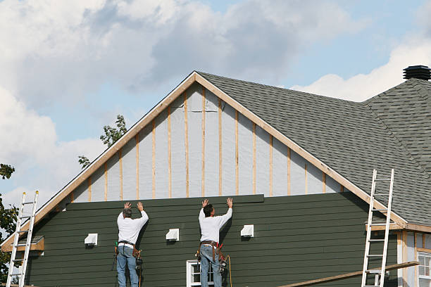 Professional Emergency Siding Repair technician working in Fresno, OH